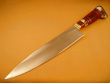 Criollo Knife handle in Stag, Wood, Leather, Bronze Criollo Knife handle in Stag, Wood, Leather, Bronze